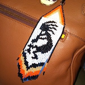 Hand crafted Native American style kokopilli purse charm